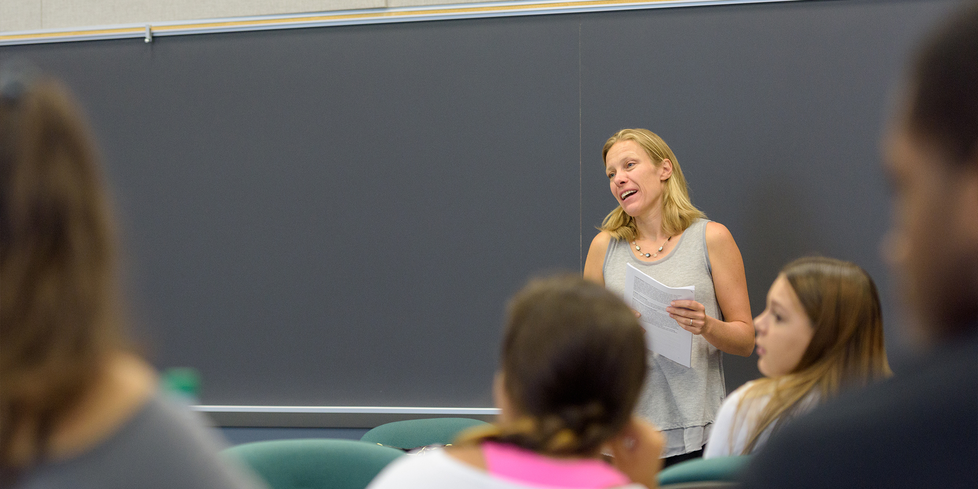 Teacher speaking to class